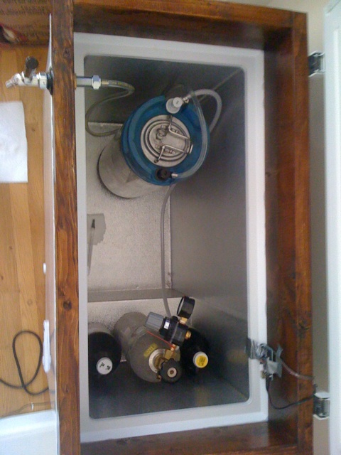 Kegerator from above showing 1 keg and CO2 tank